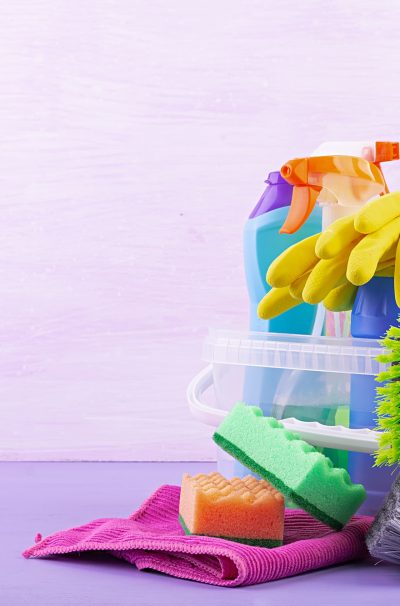 Cleaning service concept. Colorful cleaning set for different surfaces